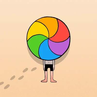Person Holding Colorful Pinwheel Lollipop